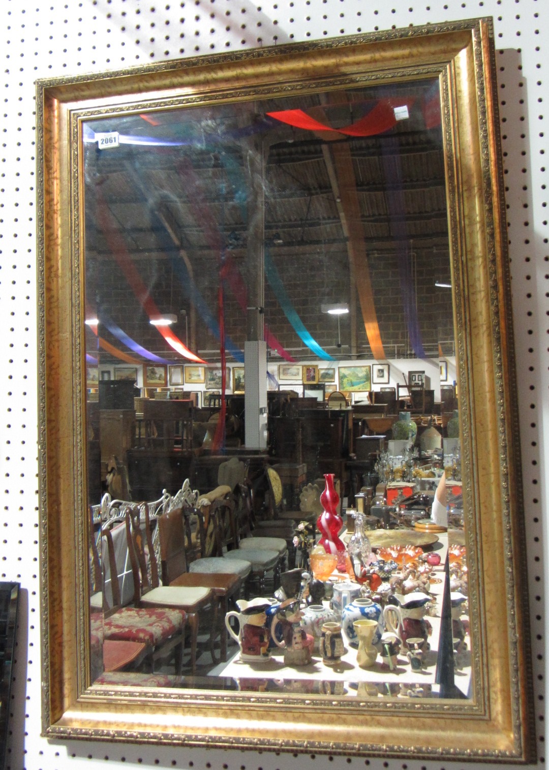 Appraisal: A th century gilt framed rectangular wall mirror