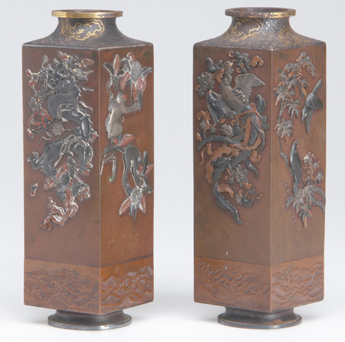 Appraisal: JAPANESE BRONZE Pair of mixed-metal four-sided vases with contrasting panels