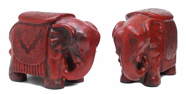 Appraisal: A pair of Chinese cinnabar elephant seats height in width