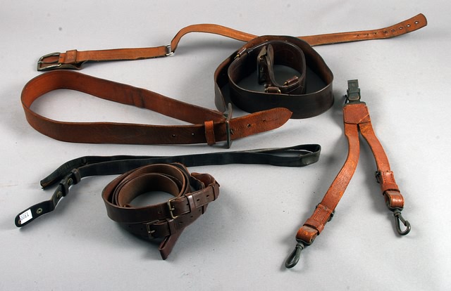 Appraisal: Grouping of two leather belts and shoulder belts belonging to