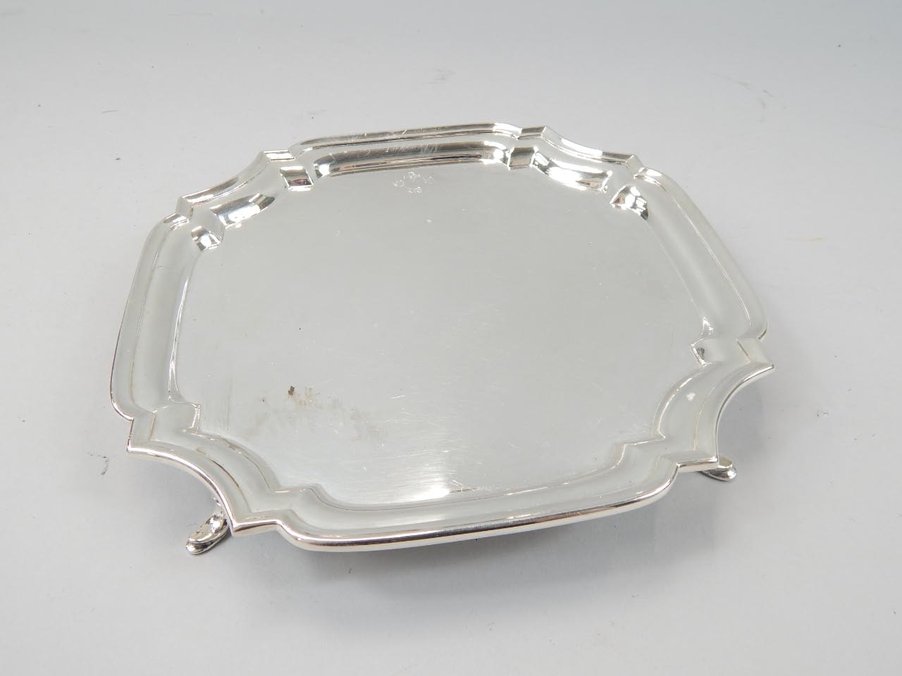 Appraisal: An Elizabeth II silver waiter of shaped circular outline raised