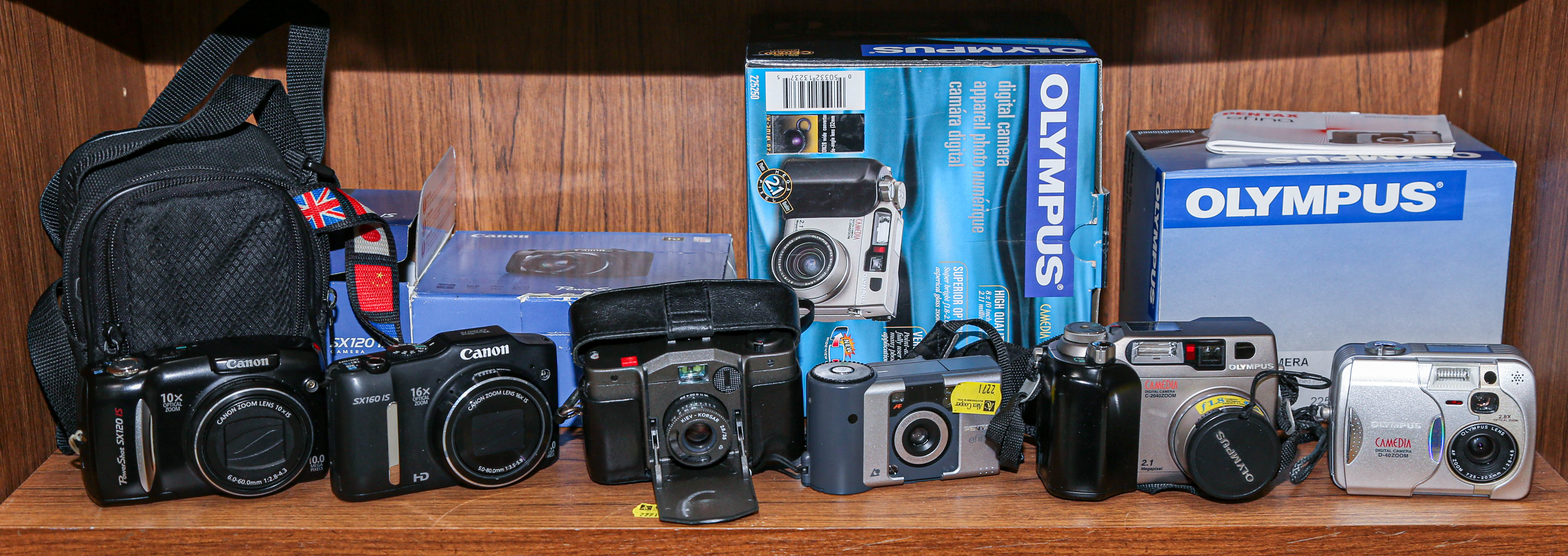 Appraisal: SIX ASSORTED DIGITAL CAMERAS Including Cannon SX IS SX IS