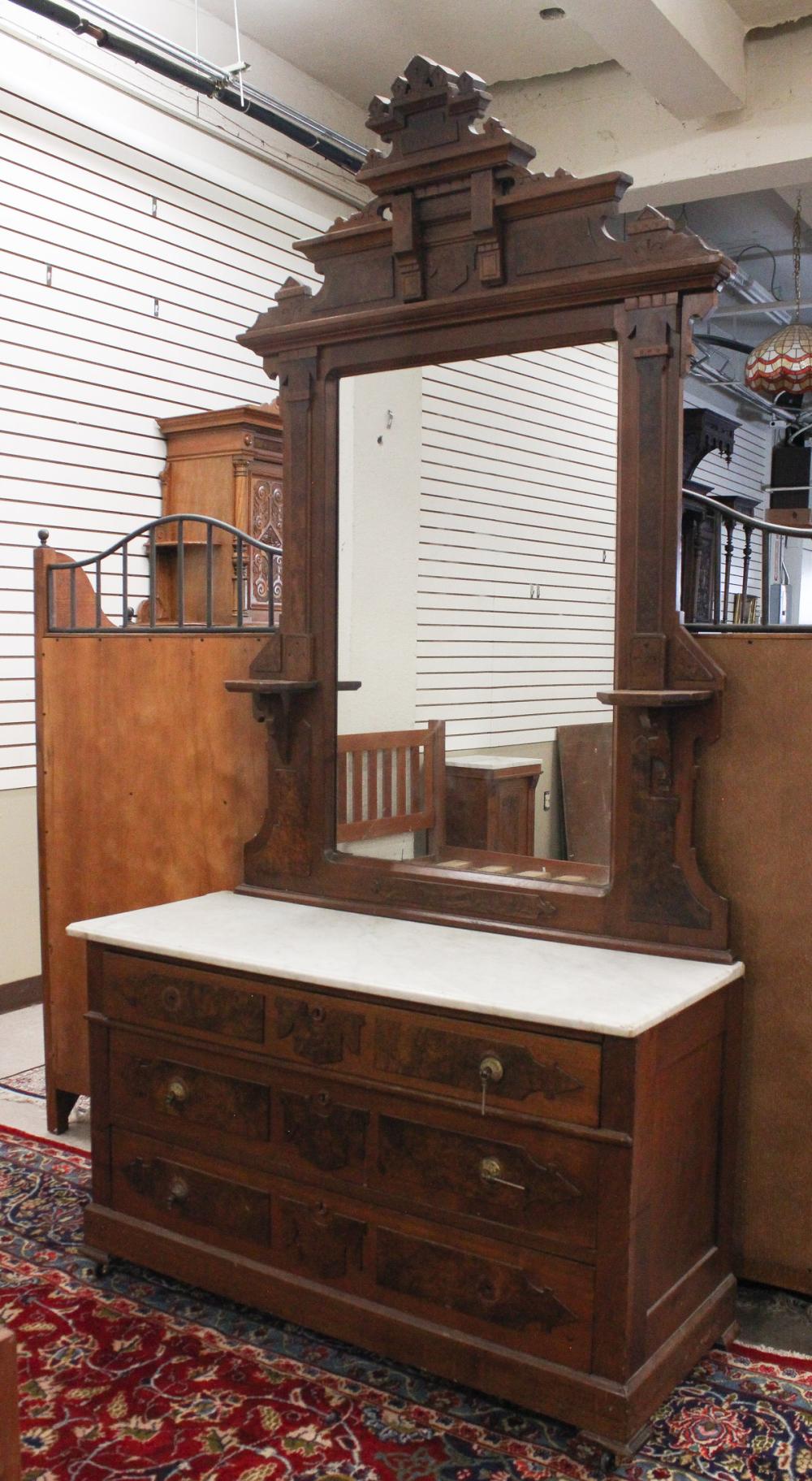 Appraisal: VICTORIAN MARBLE-TOP DRESSER WITH MIRROR Eastlake design American late th