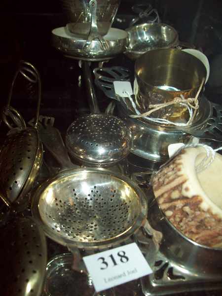 Appraisal: A COLLECTION OF TEA STRAINERS SERVIETTE RING ETC