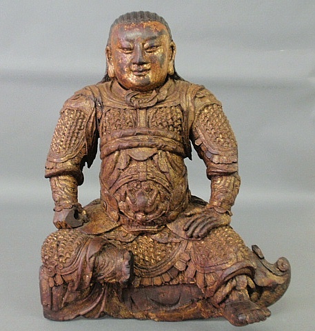 Appraisal: - Early Asian finely carved wood seated warrior figure possibly