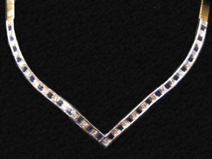 Appraisal: karat yellow and white gold sapphire and diamond necklace Thick