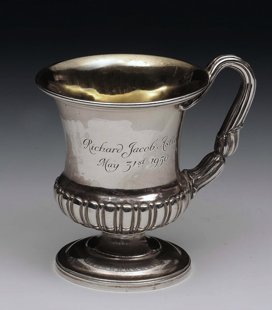 Appraisal: A GEORGE IV SILVER CAMPANA SHAPED URN with fluted lower