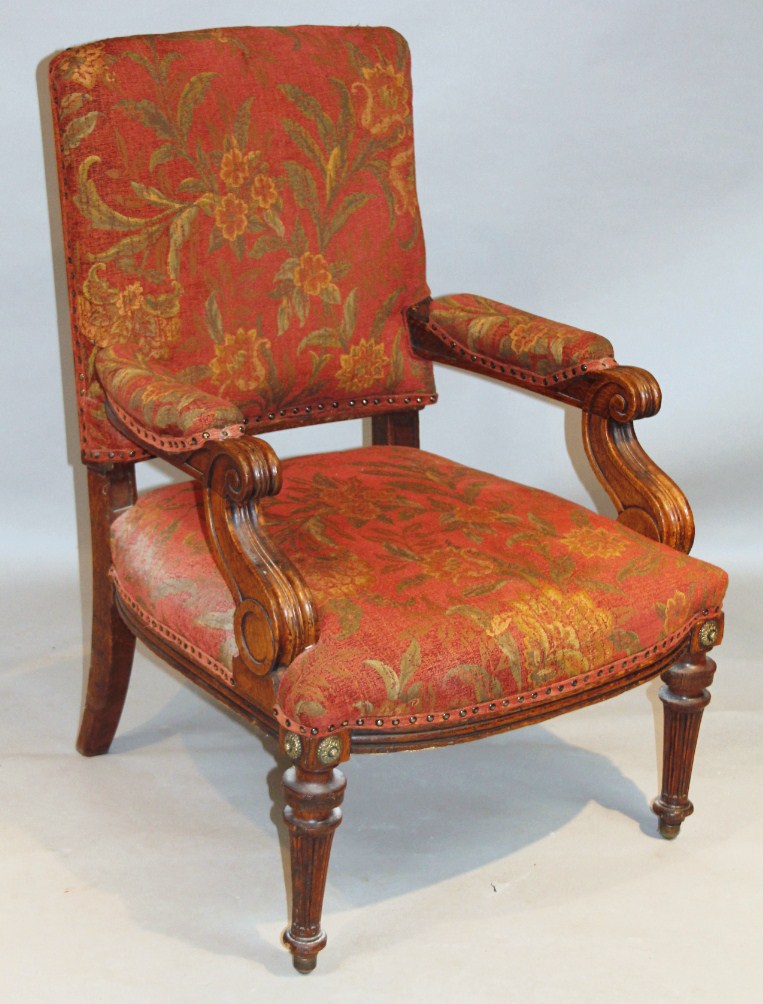 Appraisal: A thC oak framed Gainsborough armchair with overstuffed back arms