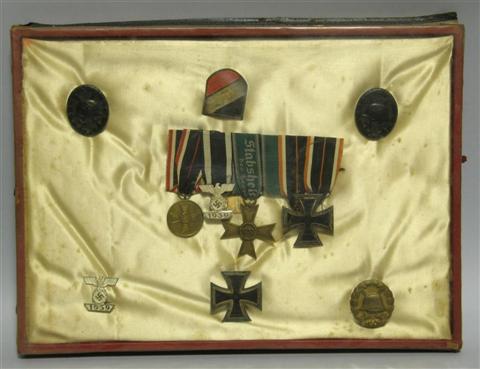 Appraisal: COLLECTION OF NAZI MEDALS AND SWORD Ten Third Reich medals