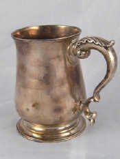 Appraisal: A George III silver baluster mug with leaf capped double