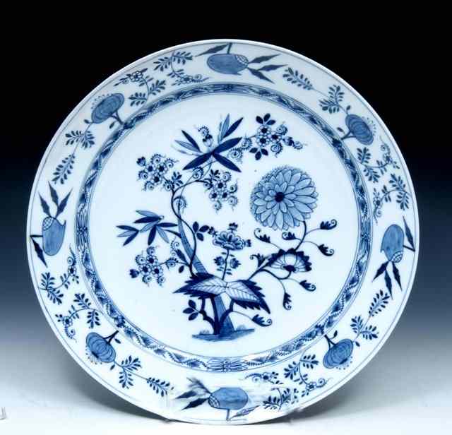 Appraisal: A MEISSEN BROAD RIM BLUE AND WHITE CHARGER the centre