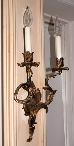 Appraisal: Title brass vine sconces with lights and floral decoration Medium