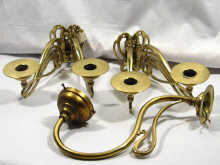 Appraisal: A pair of brass double piano sconces and one other