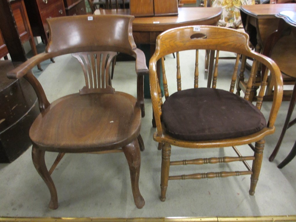 Appraisal: Two Edwardian captains armchairs