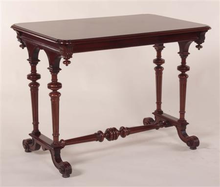 Appraisal: A late th Victorian style mahogany Gothic revival stretcher table