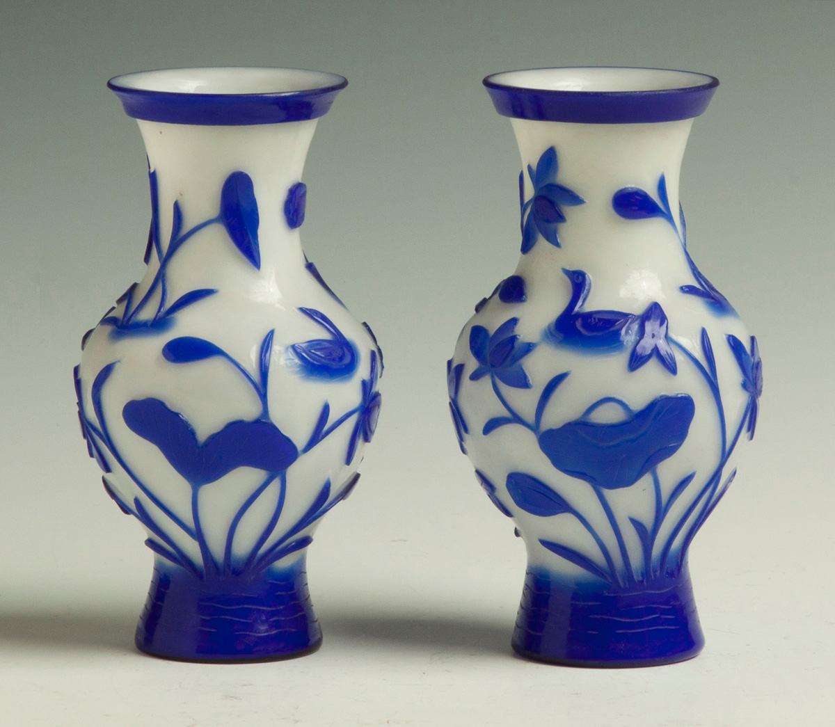 Appraisal: Chinese Peking Glass Blue Overlay Vases Early th cent Water