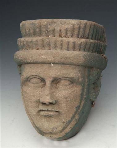 Appraisal: AN OLD EASTERN STONE HEAD with tiered head dress high