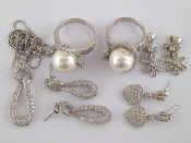 Appraisal: A quantity of white metal tests silver jewellery comprising a