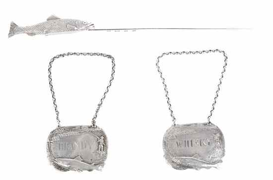 Appraisal: A pair of silver fishing theme decanter labels by C