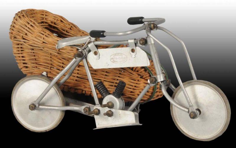 Appraisal: Unusual French Tin Wind-Up Motorcycle Toy Description Unusual wicker sidecar