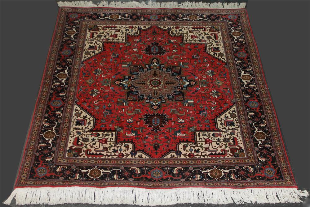 Appraisal: PERSIAN TABRIZ WITH TAUPE CENTRAL MEDALLION having a central radiating