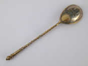 Appraisal: A Russian silver gilt lemon tea spoon the back of