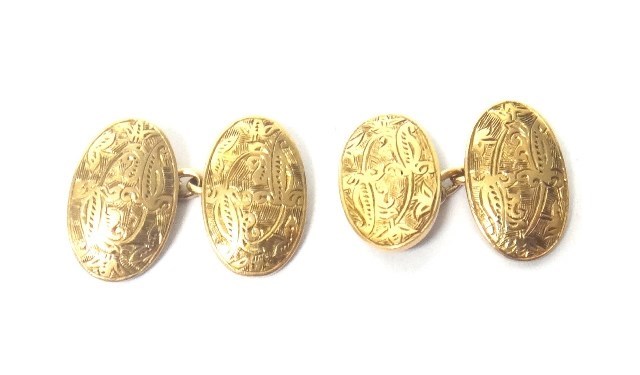 Appraisal: A pair of ct gold oval cufflinks the backs and