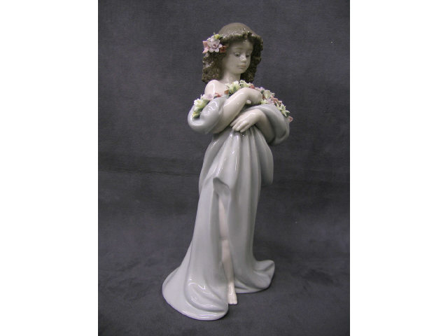 Appraisal: Lladro Porcelain Petals of Love figure depicting girl with flowers