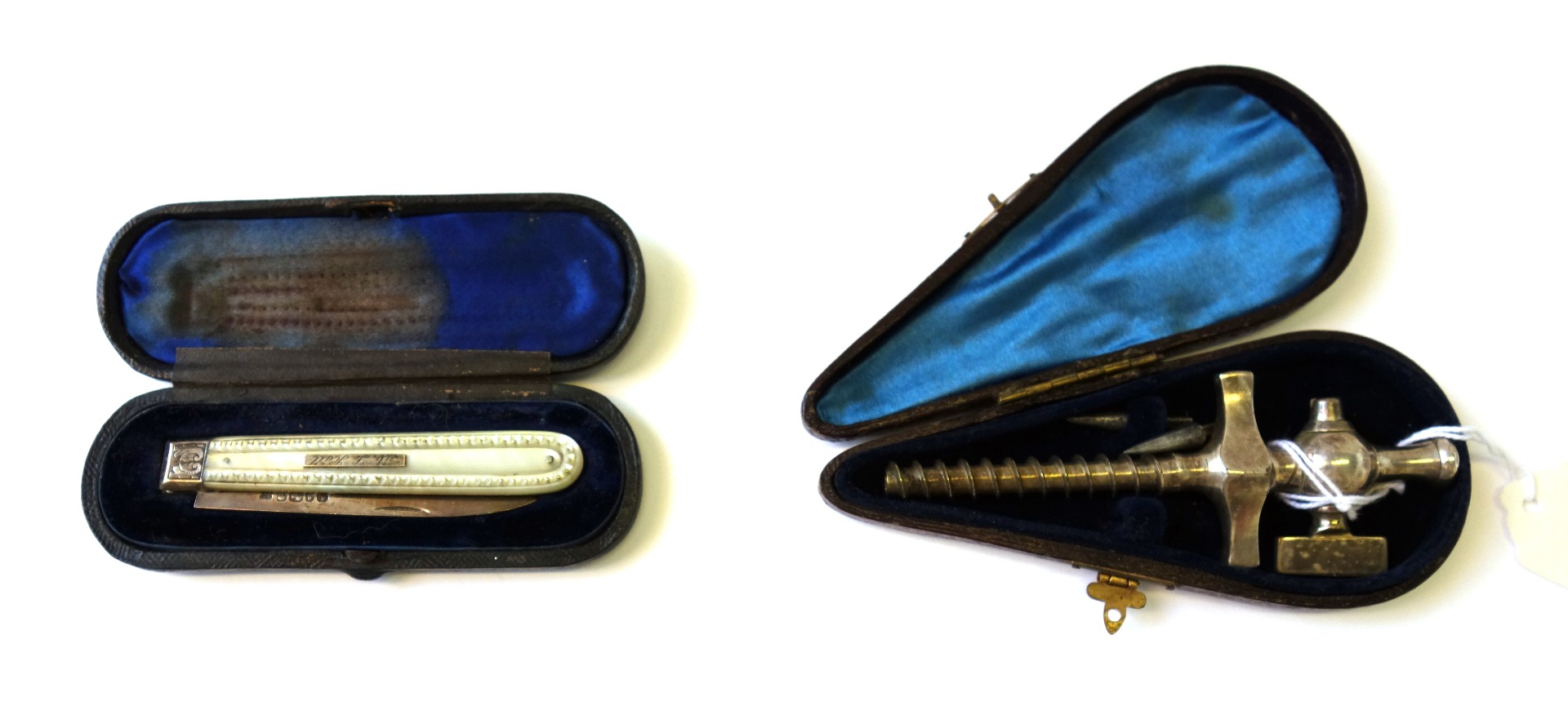 Appraisal: An Edwardian champagne tap in a velvet lined leather case