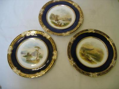 Appraisal: A SET OF THREE COALPORT CHINA PLATES of circular form