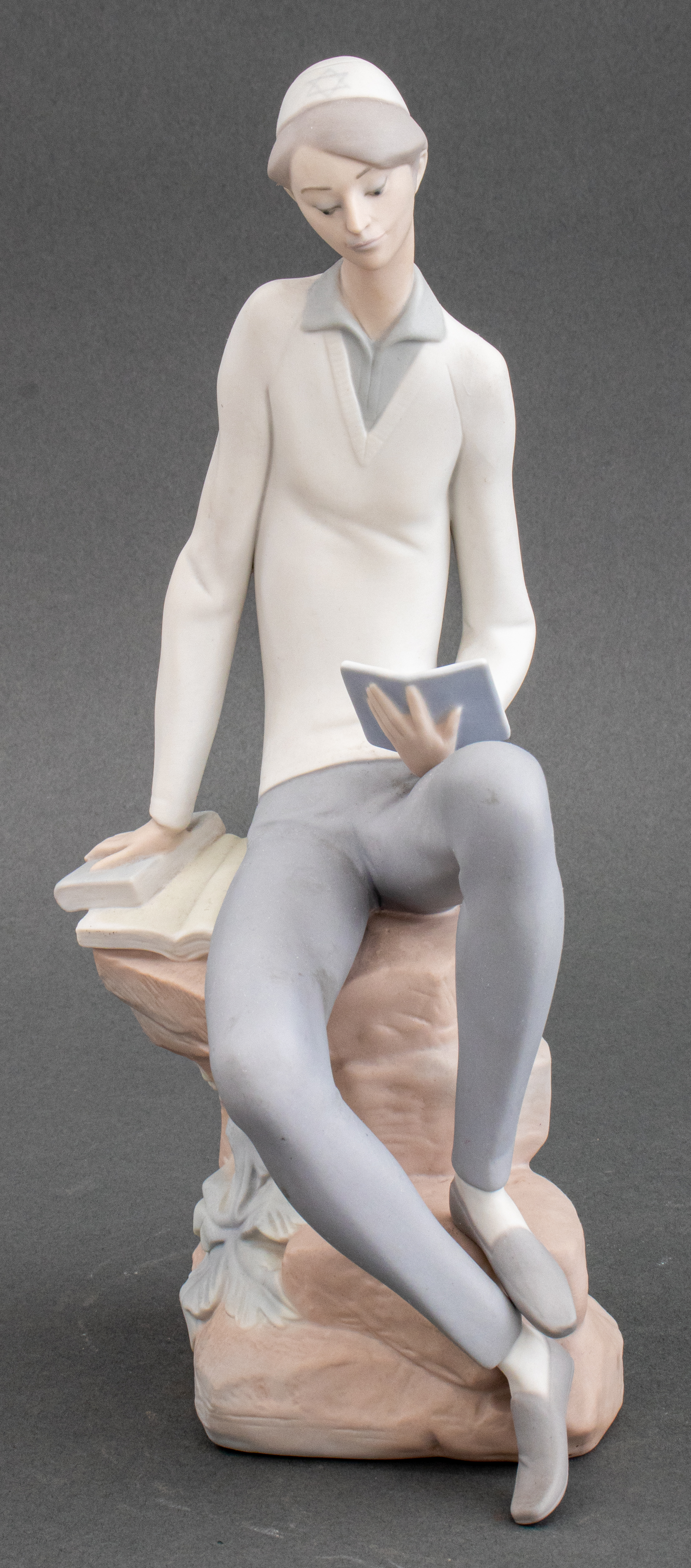 Appraisal: LLADRO HEBREW STUDENT READING PORCELAIN FIGURINE Lladro Hebrew Student Reading