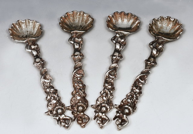 Appraisal: A SET OF FOUR VICTORIAN CAST SILVER MUSTARD SPOONS the