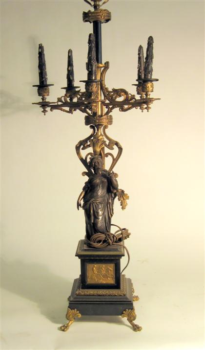 Appraisal: Napoleon III gilt and patinated bronze six arm candelabrum late