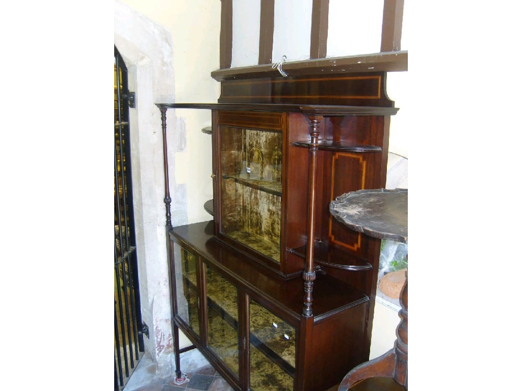 Appraisal: An Edwardian mahogany display cabinet the upper section fitted with