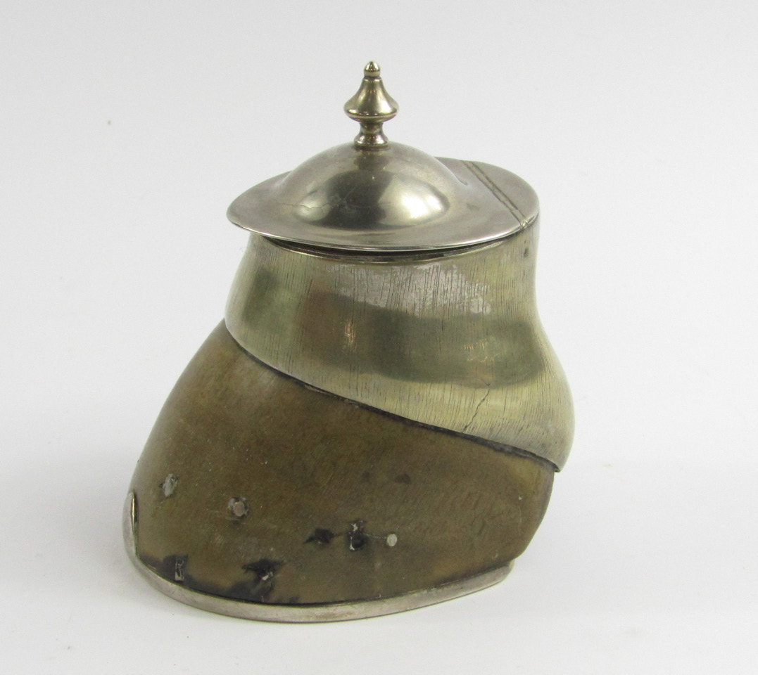 Appraisal: A novelty pony's hoof inkwell with plated mount and hinged