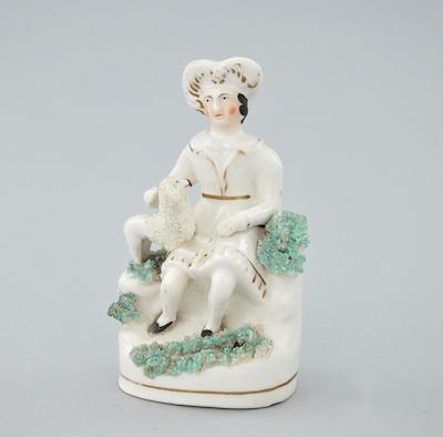 Appraisal: A Staffordshire Figural Seated Figure with a Poodle Seated in