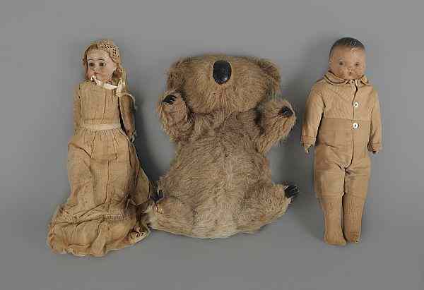 Appraisal: Bisque head doll late th c together with a rubber