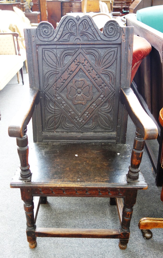 Appraisal: A th century and later oak Wainscot chair with carved