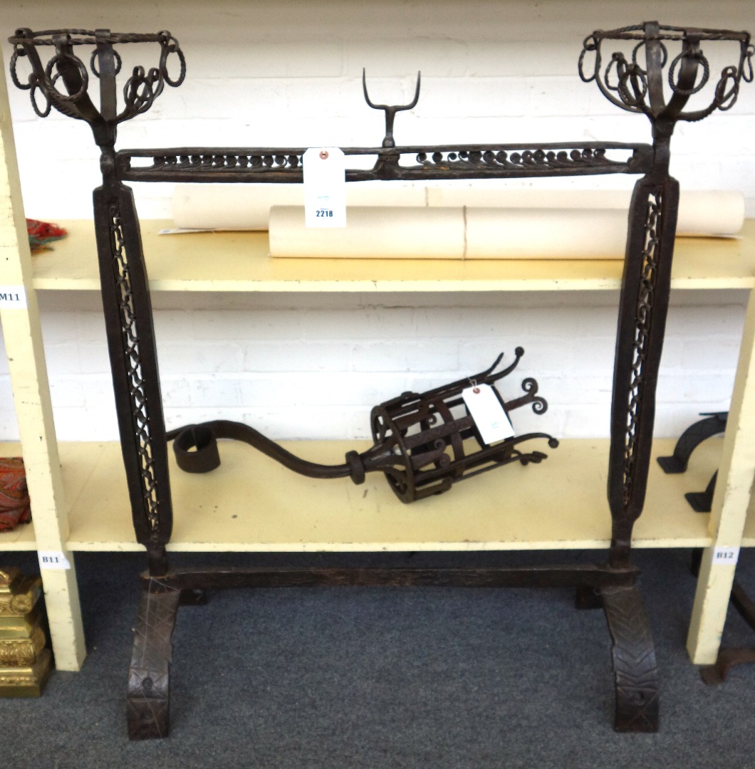 Appraisal: A Continental wrought iron hearth stand of th century style