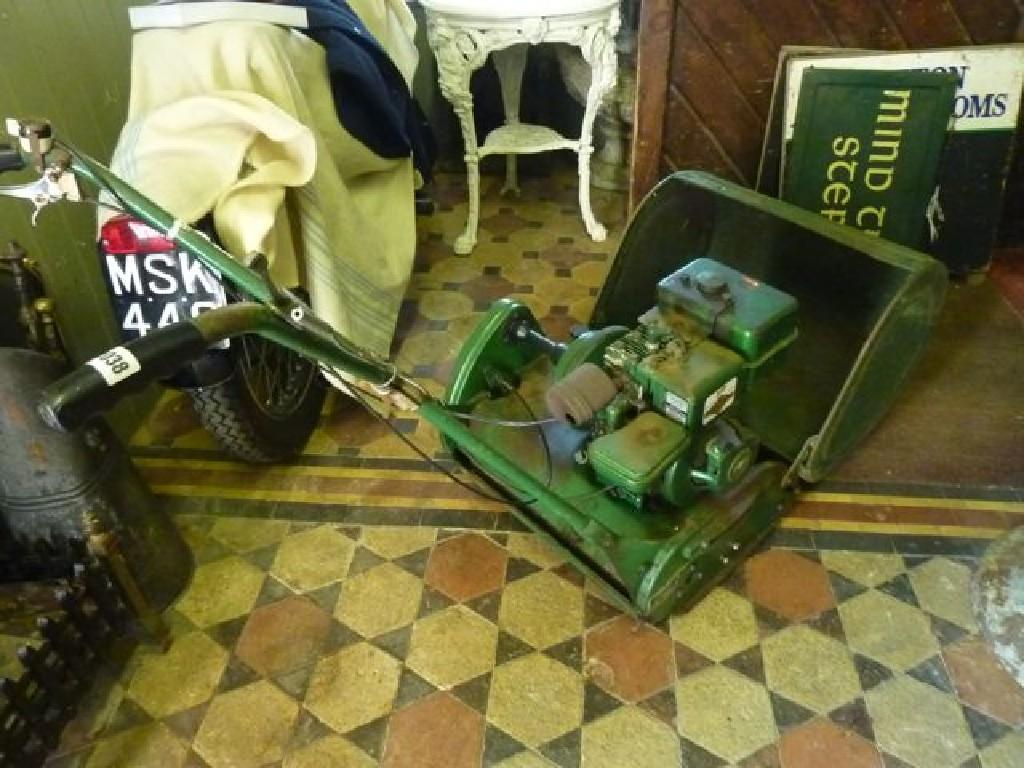 Appraisal: A vintage Ransomes Marquis lawn mower with inch cut and