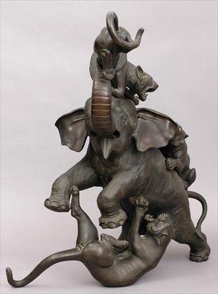 Appraisal: JAPANESE BRONZE ANIMALIER GROUP Modeled as a rearing elephant with