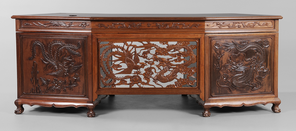 Appraisal: Carved Hardwood Desk Chinese modern shaped top over elaborately carved