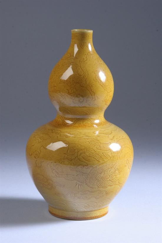 Appraisal: CHINESE YELLOW PORCELAIN DOUBLE GOURD VASE Guangxu six-character incised mark