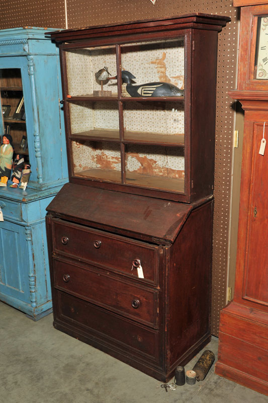 Appraisal: TWO PIECE SECRETARY BOOKCASE Early bookcase having a stepped cornice