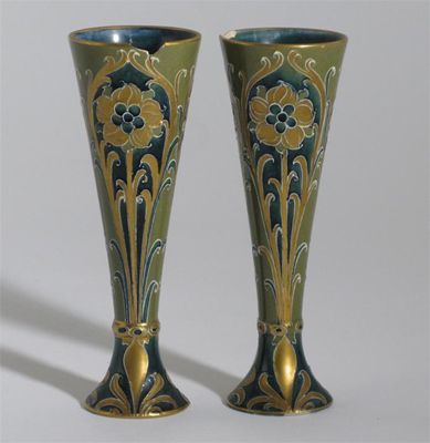 Appraisal: A pair of Moorcroft Pottery green and gold Florian Ware