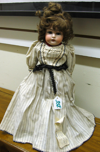 Appraisal: J D KESTNER CHILD DOLL having bisque shoulder head with