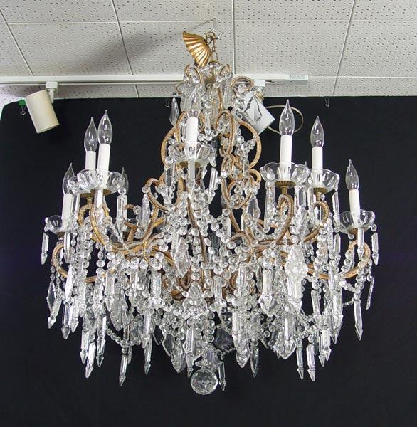 Appraisal: LIGHT CRYSTAL CHANDELIER Bronzed metal frame with bead trim swags