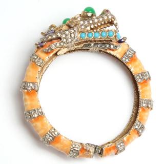 Appraisal: Kenneth Jay Lane Orange Dragon Costume Bracelet A hinged bypass