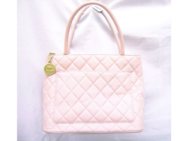 Appraisal: Chanel Handbag pink quilted leather with logo leather handles zipper