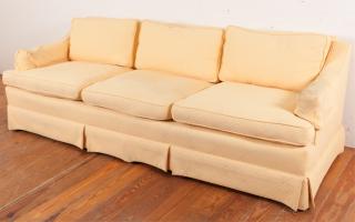 Appraisal: Upholstered -seat couch with loose back cushions and swoop arms